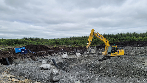 Yellow ROQ digger on site