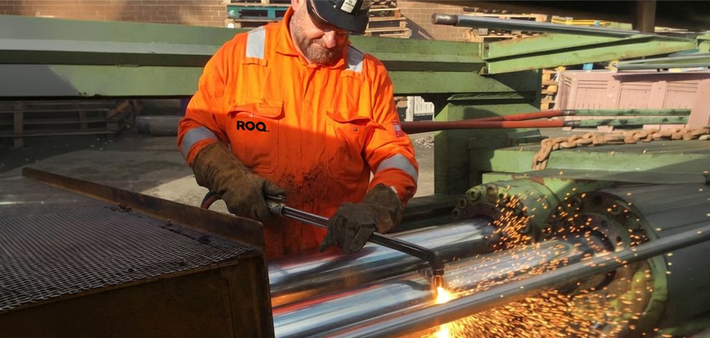 Man welding metal sheet